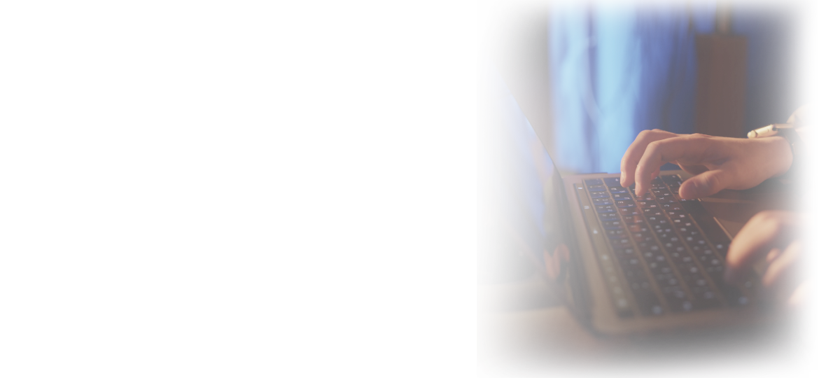 Human hands clicking on a keyboard and a mouse